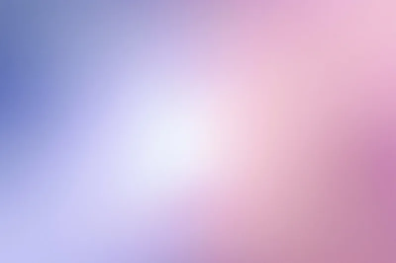 Soft abstract gradient background transitioning from blue to pink with smooth color blend
