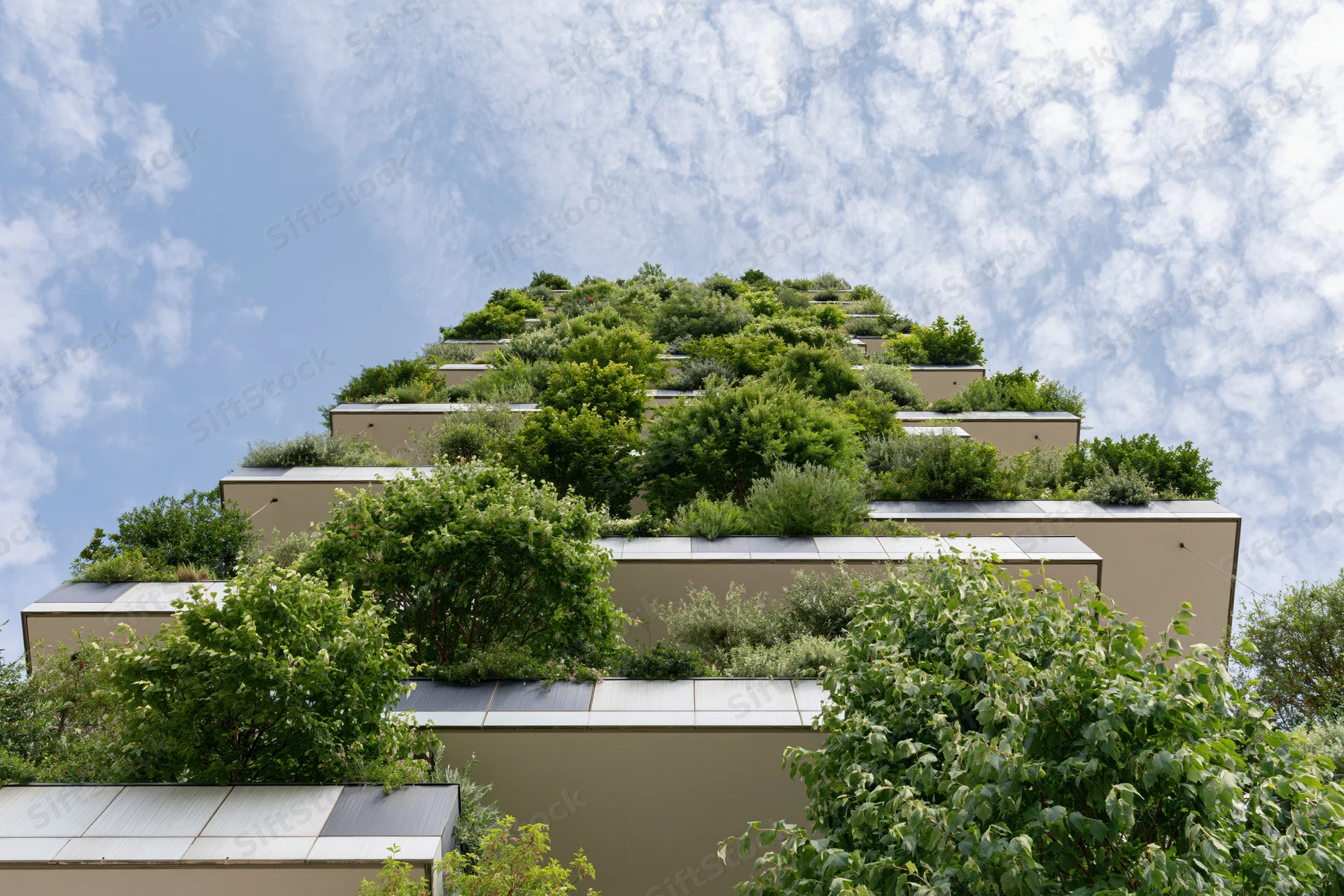 Bosco Verticale residential tower facade covered in trees