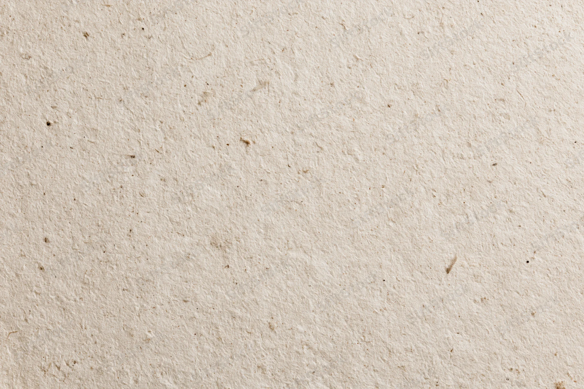 Close-up flat lay of recycled kraft paper surface filling the frame