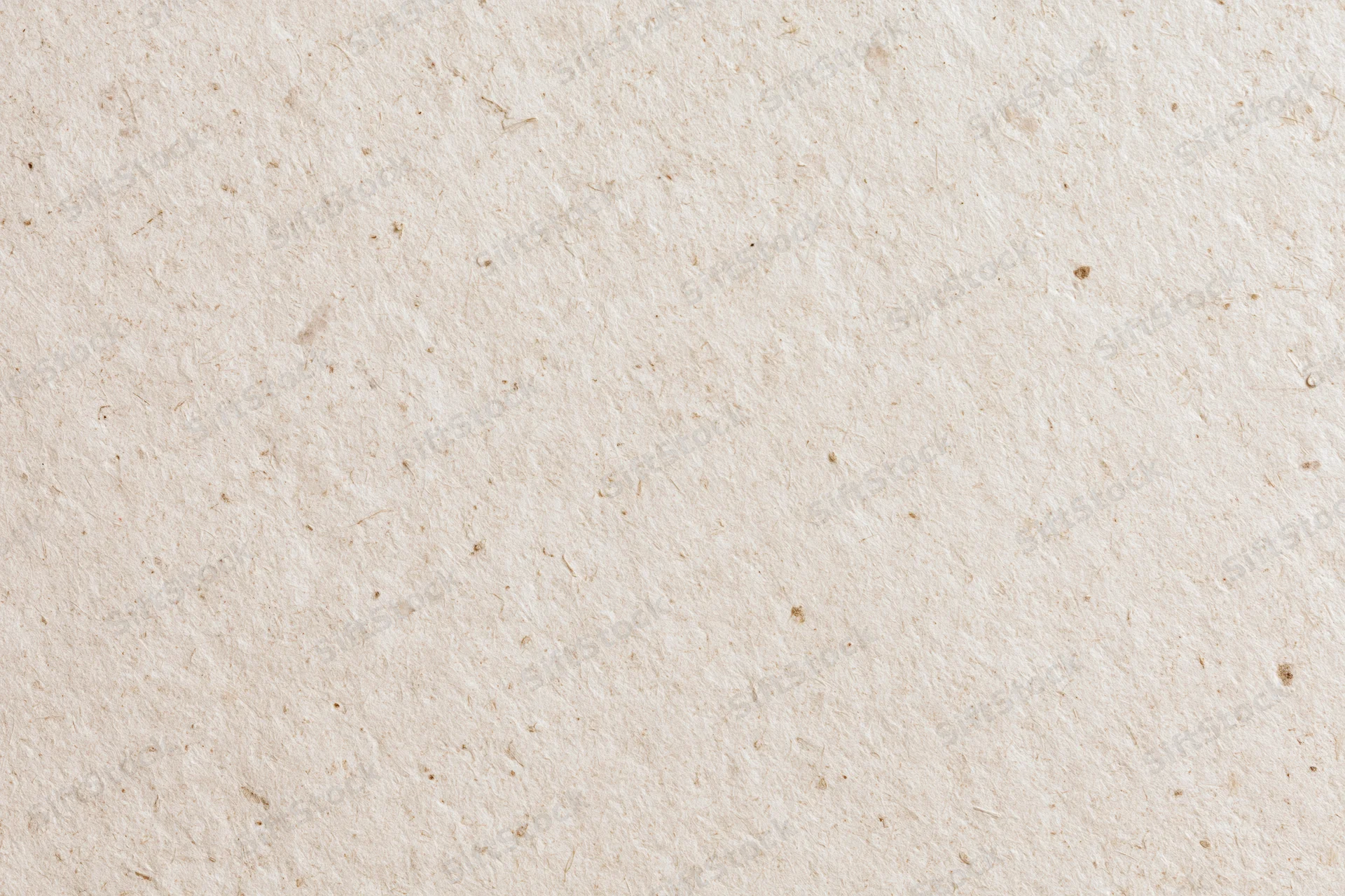 Close-up flat lay of recycled kraft paper surface filling the frame