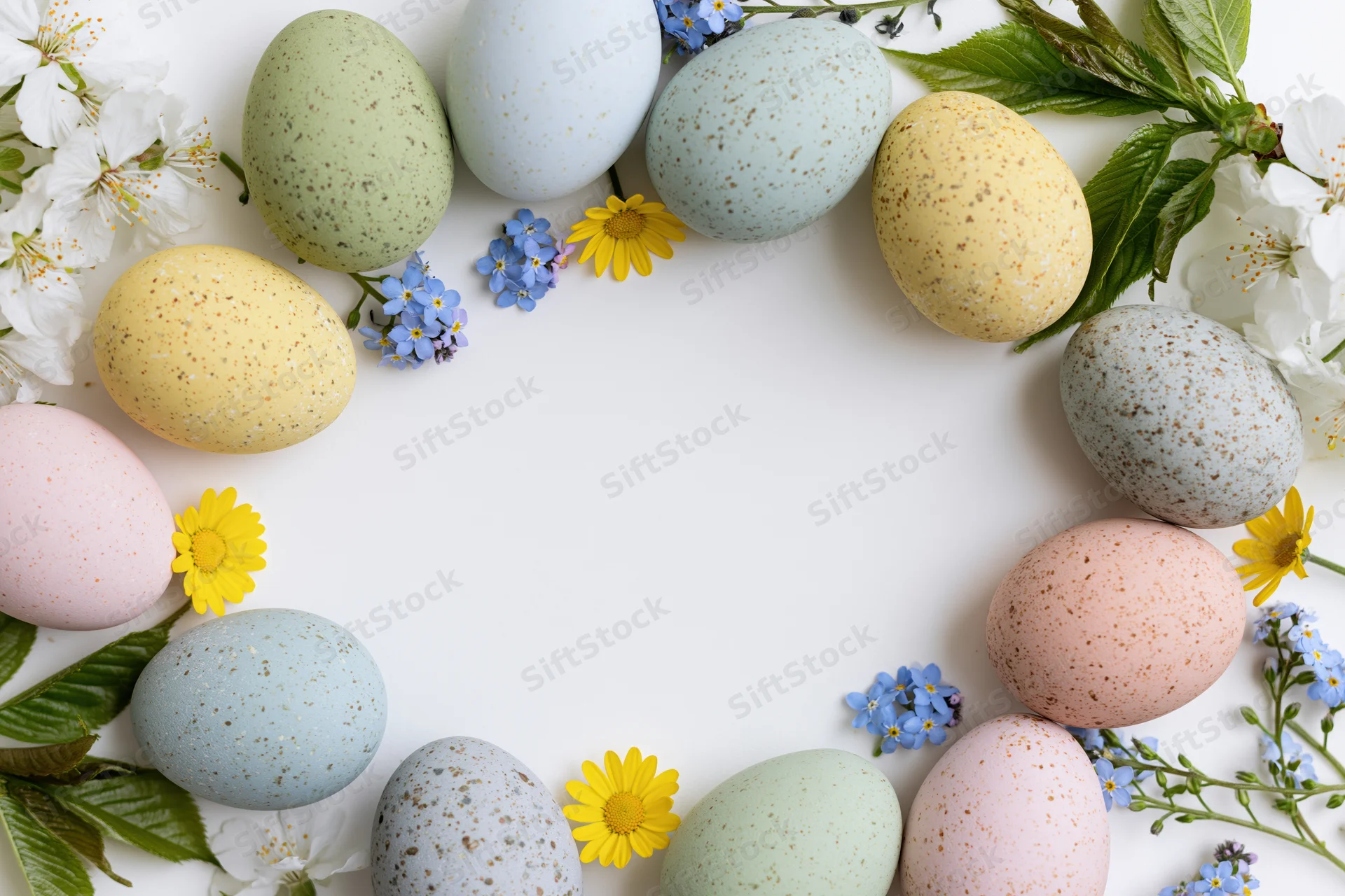Pastel speckled easter eggs arranged in a floral frame with cherry blossoms and wildflowers on white background