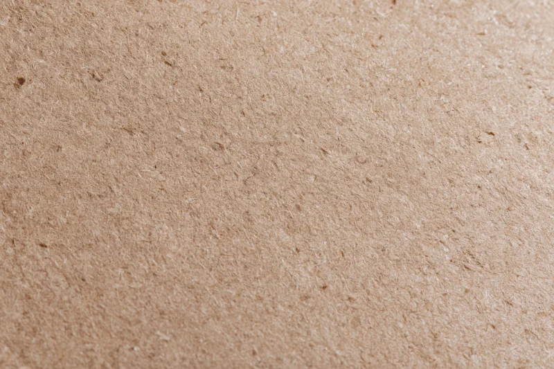 Close-up of smooth mdf or hardboard surface filling the frame