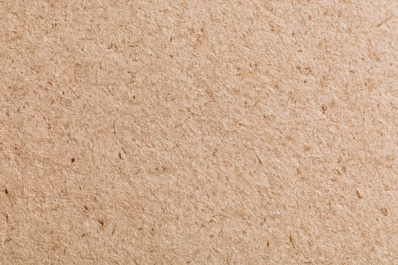 Close-up of smooth mdf or hardboard surface filling the frame