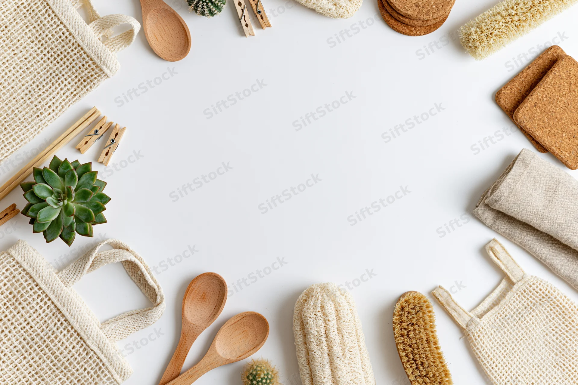 Zero-waste household items arranged in a border frame on white background