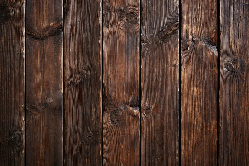 Aged vertical wooden planks arranged in a flat-lay pattern filling the frame