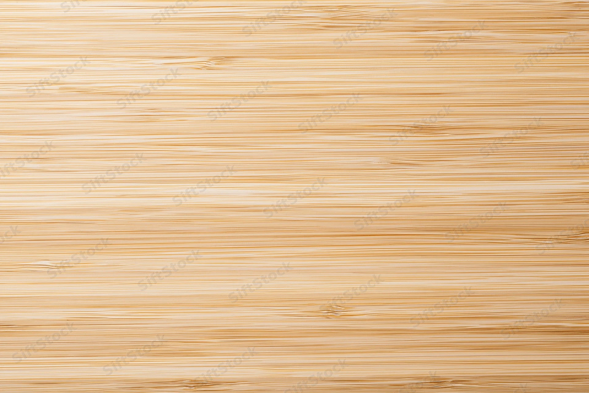 Close-up flat lay of a light bleached bamboo wood surface with horizontal grain pattern