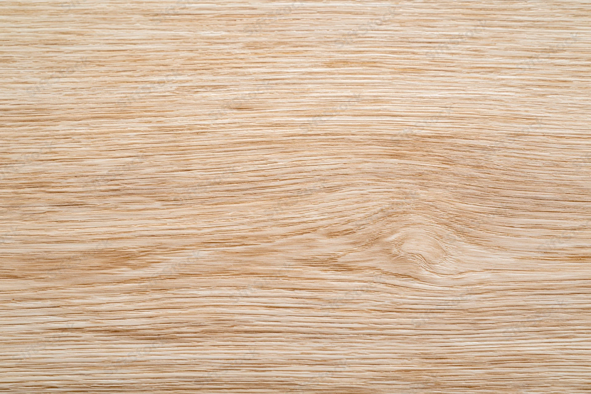 Close-up flat lay of light oak wood surface showing natural grain pattern