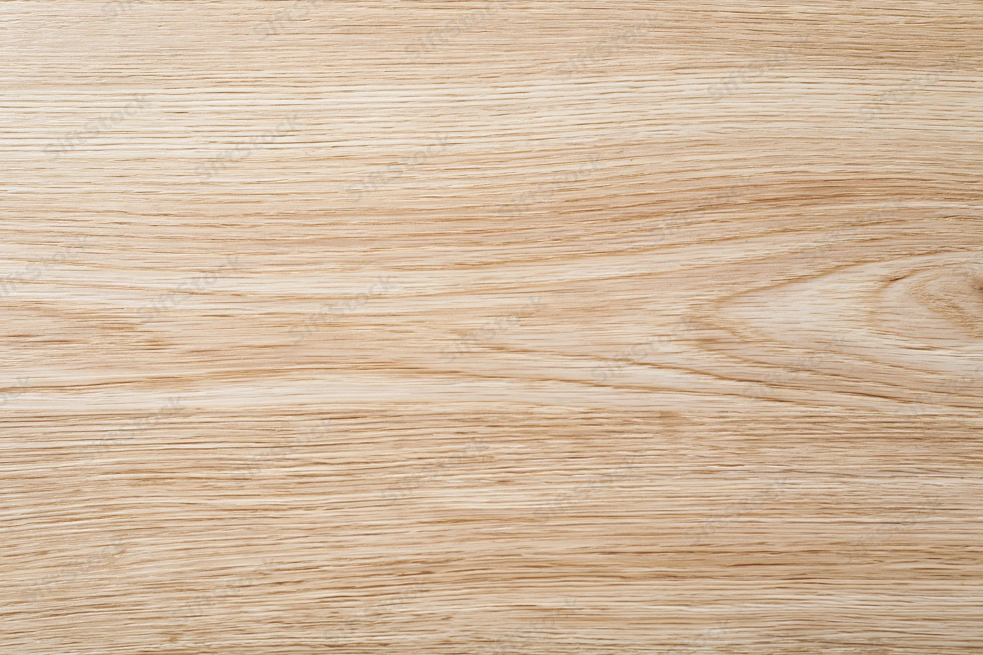 Close-up flat lay of light oak wood surface showing natural grain pattern