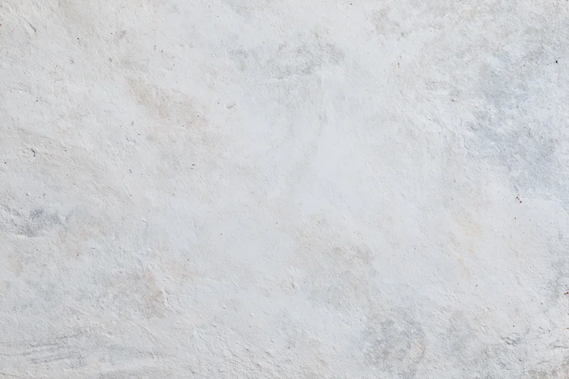 Smooth concrete wall surface filling the frame in a close-up flat shot