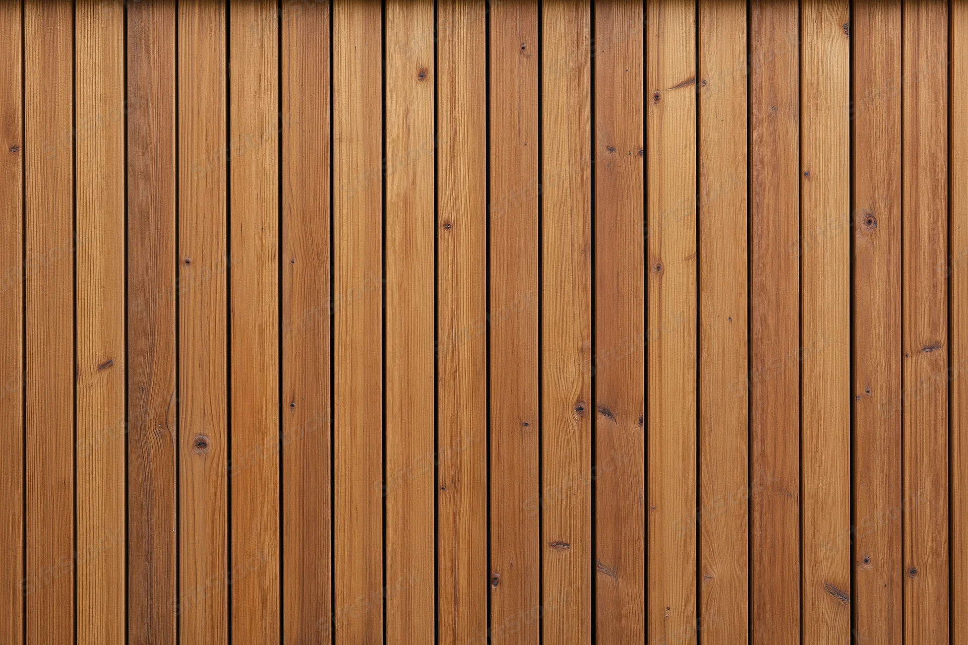 Vertical wooden wall cladding panels arranged in a flat close-up view