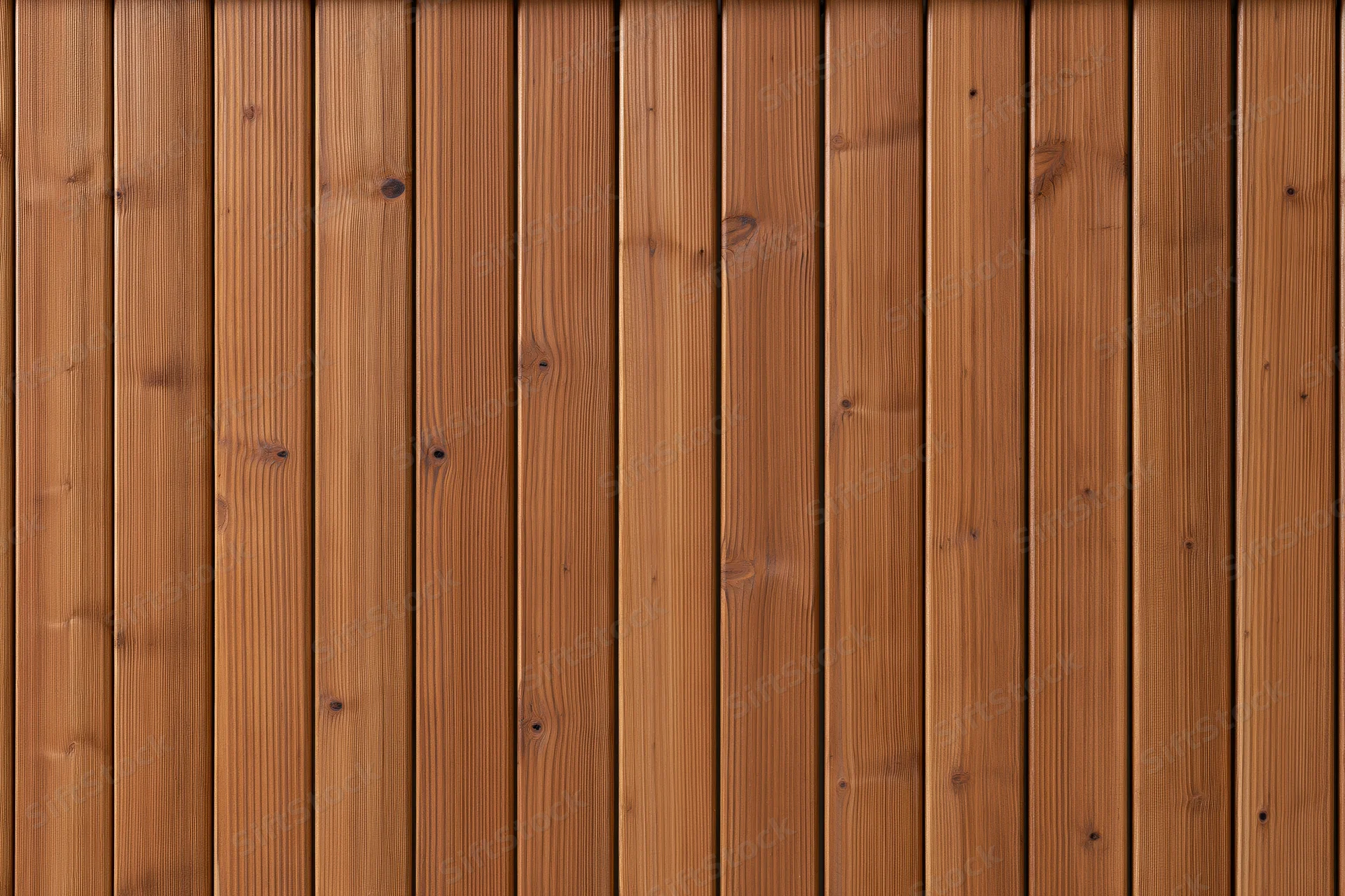 Vertical wooden wall cladding panels arranged in a flat close-up view