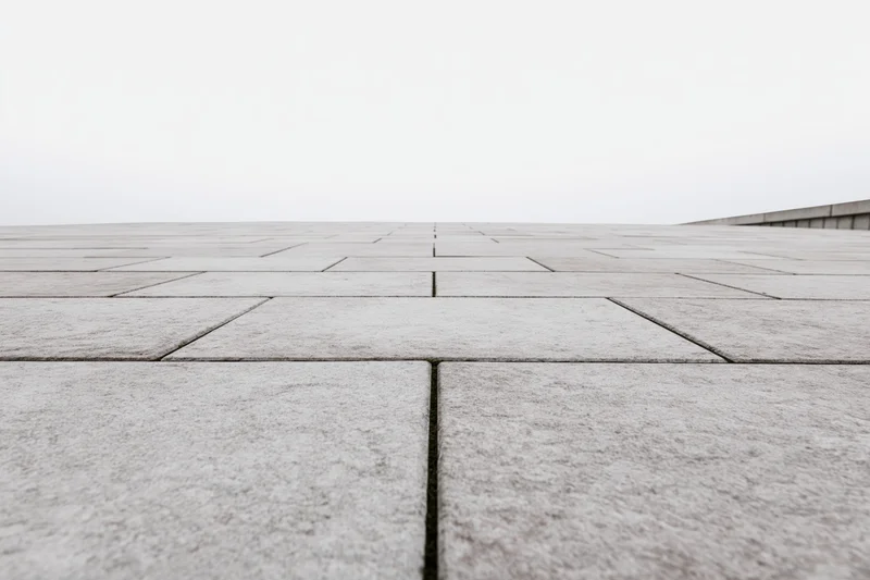 Stone tile plaza floor stretching to the horizon outdoors