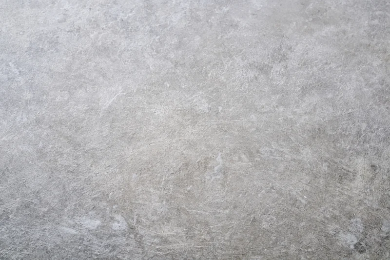 Flat concrete surface filling the frame as a neutral background