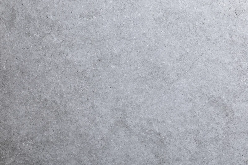 Flat concrete surface texture filling the frame as a seamless background