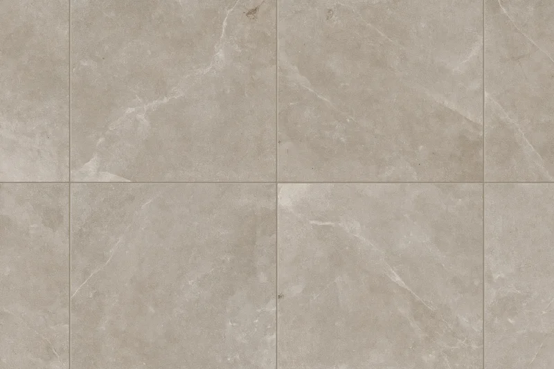 Large-format stone-look ceramic floor tiles arranged in a grid pattern for interior flooring