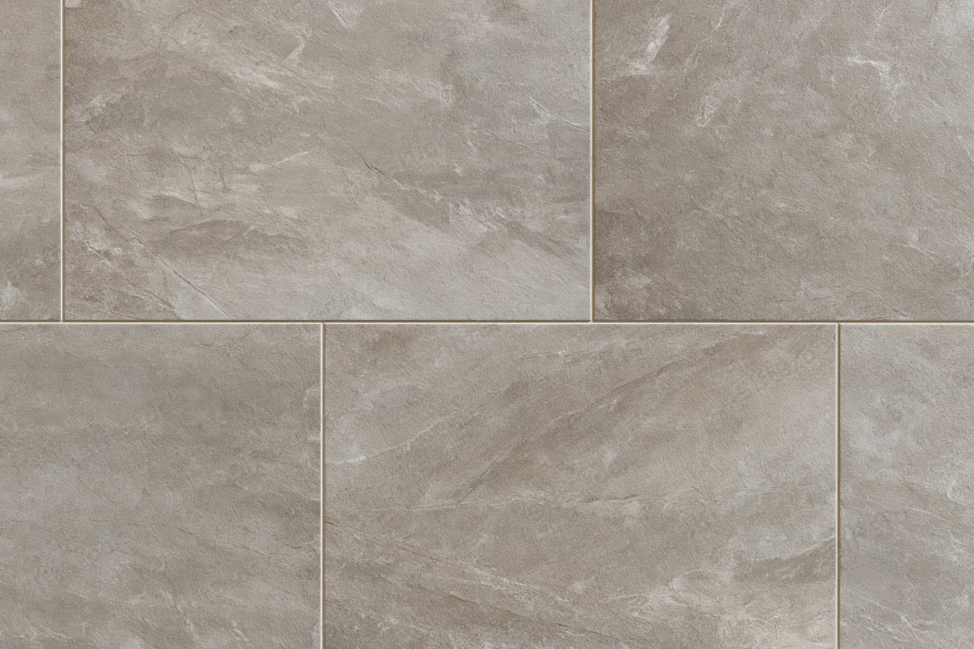 Large-format stone-look ceramic floor tiles arranged in a grid pattern for interior flooring