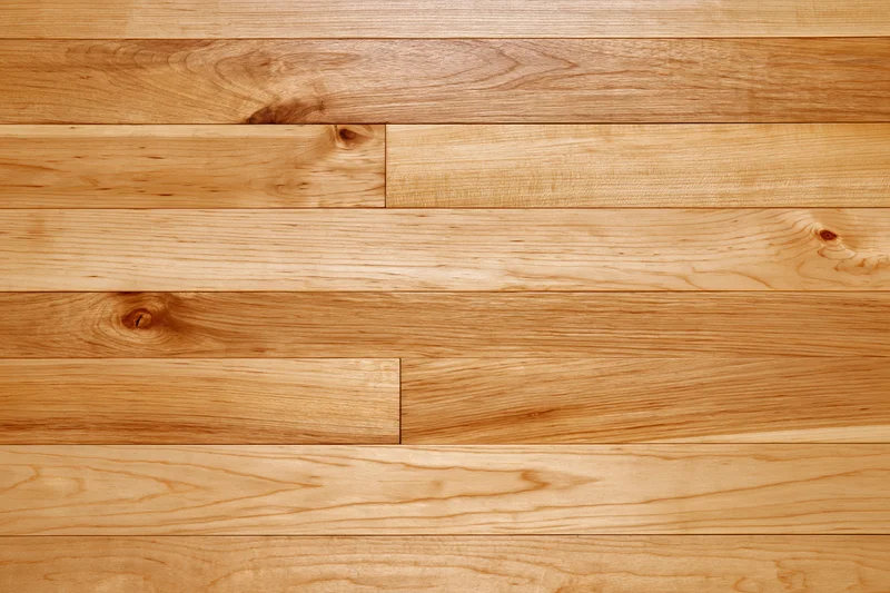Hardwood strip floor arranged horizontally in a flat overhead view