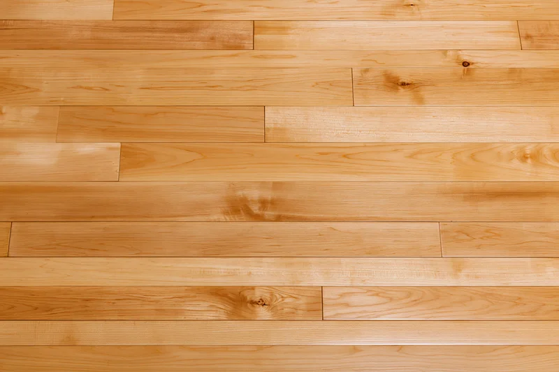Horizontal hardwood strip flooring in a residential interior space