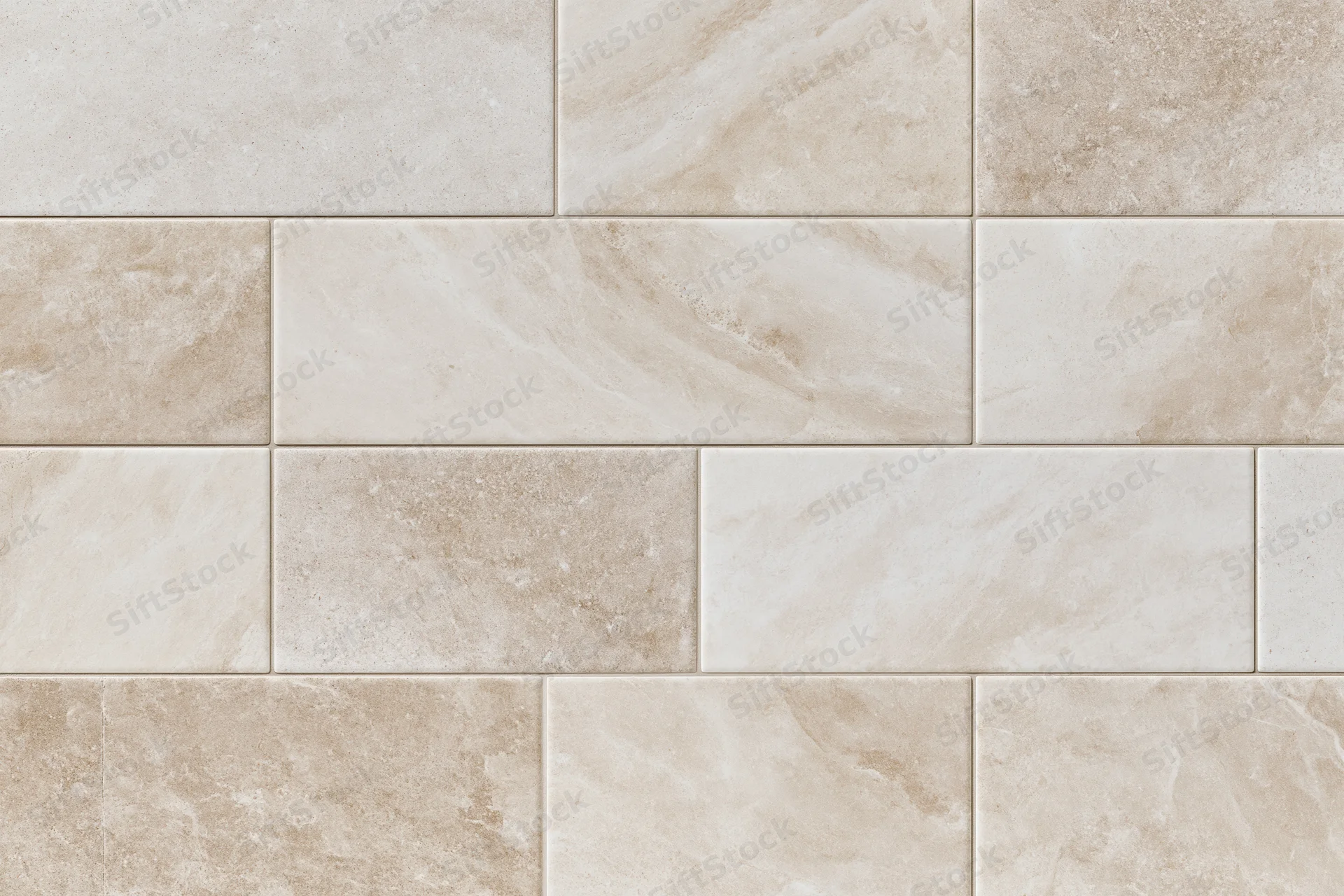 Large-format ceramic floor tiles arranged in a staggered pattern with stone-like veining and neutral beige tones