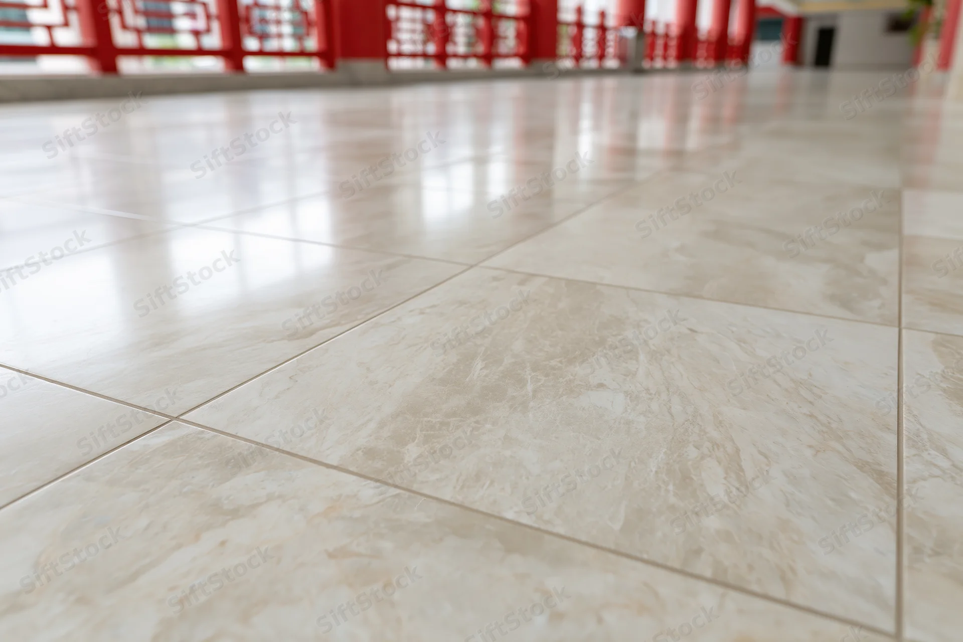 Polished marble tile floor filling the frame in a traditional Chinese interior space