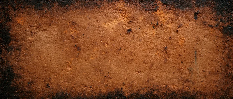 Weathered concrete wall with rust stains and grunge texture, showing aged surface details