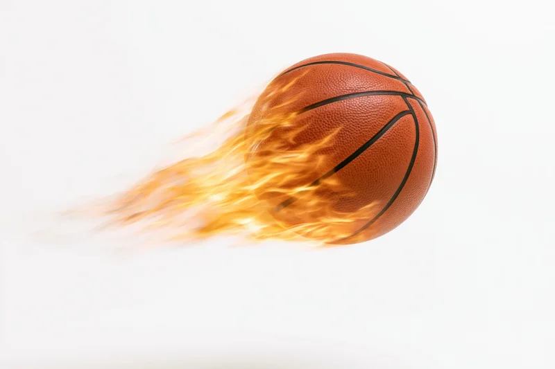Basketball engulfed in trailing flames streaking through white space