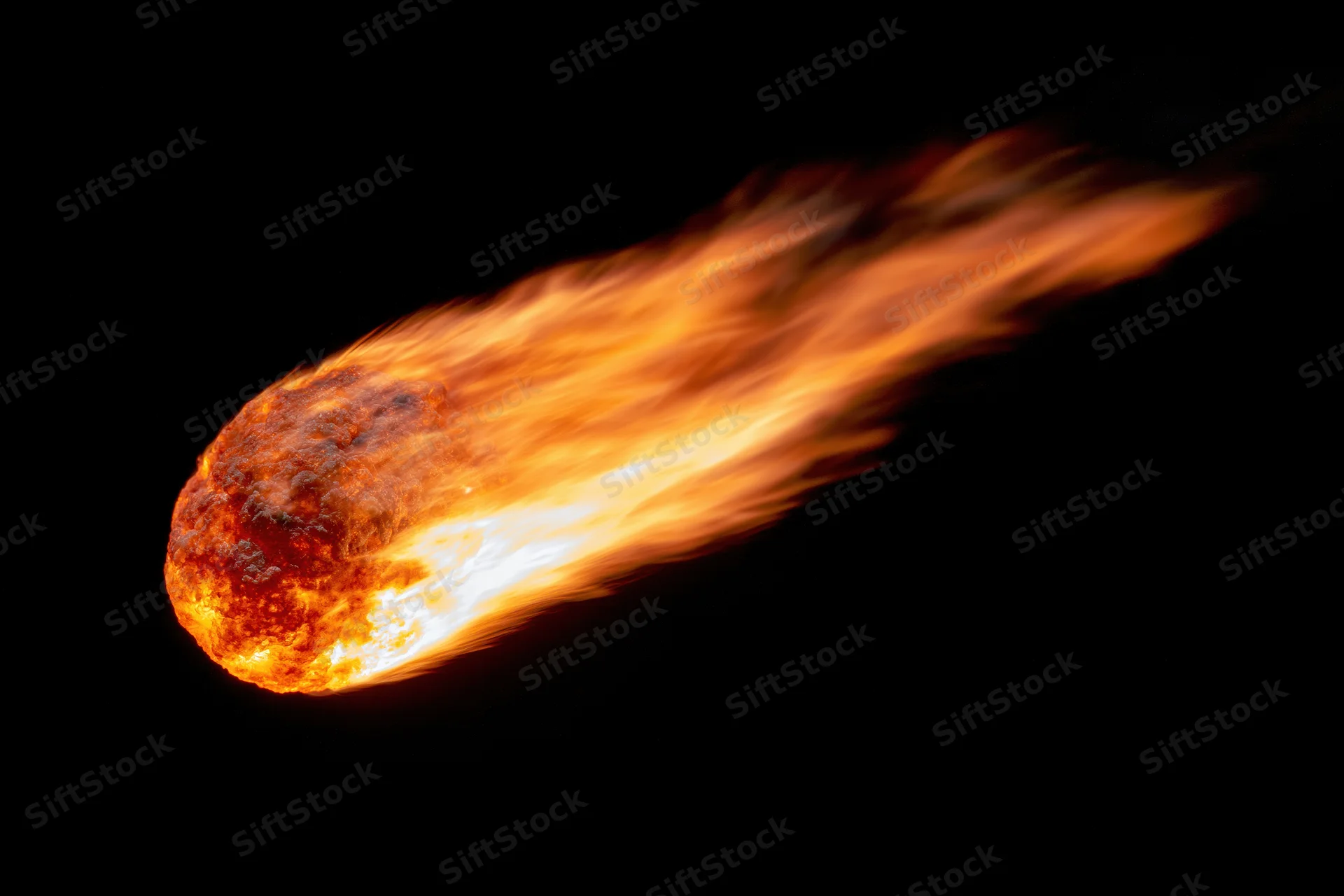 Glowing meteor with fiery trail moving diagonally across dark space