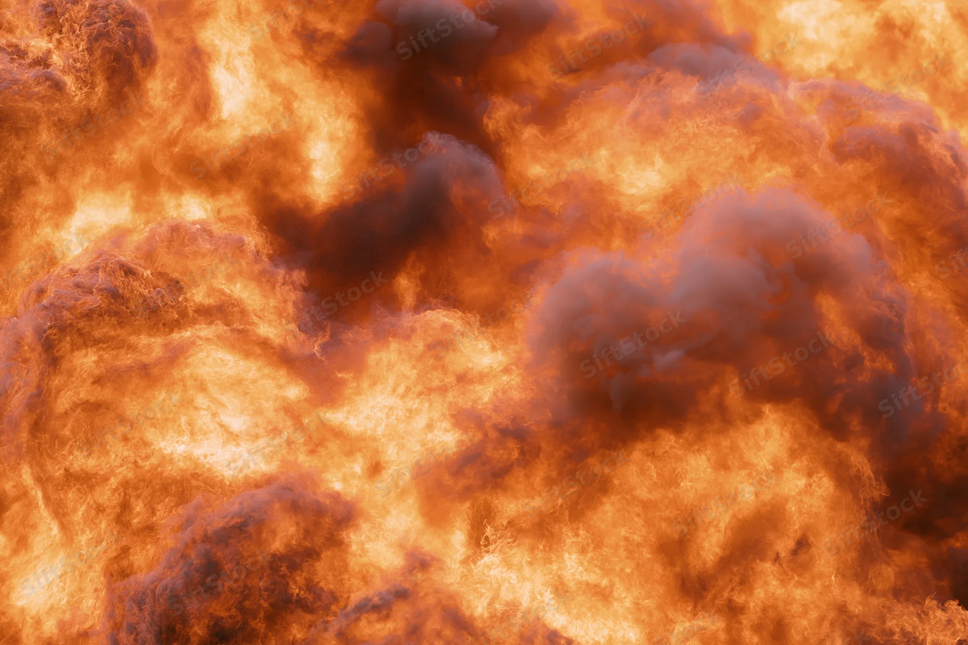 Roaring fire engulfing the entire frame with intense orange and red flames and billowing smoke