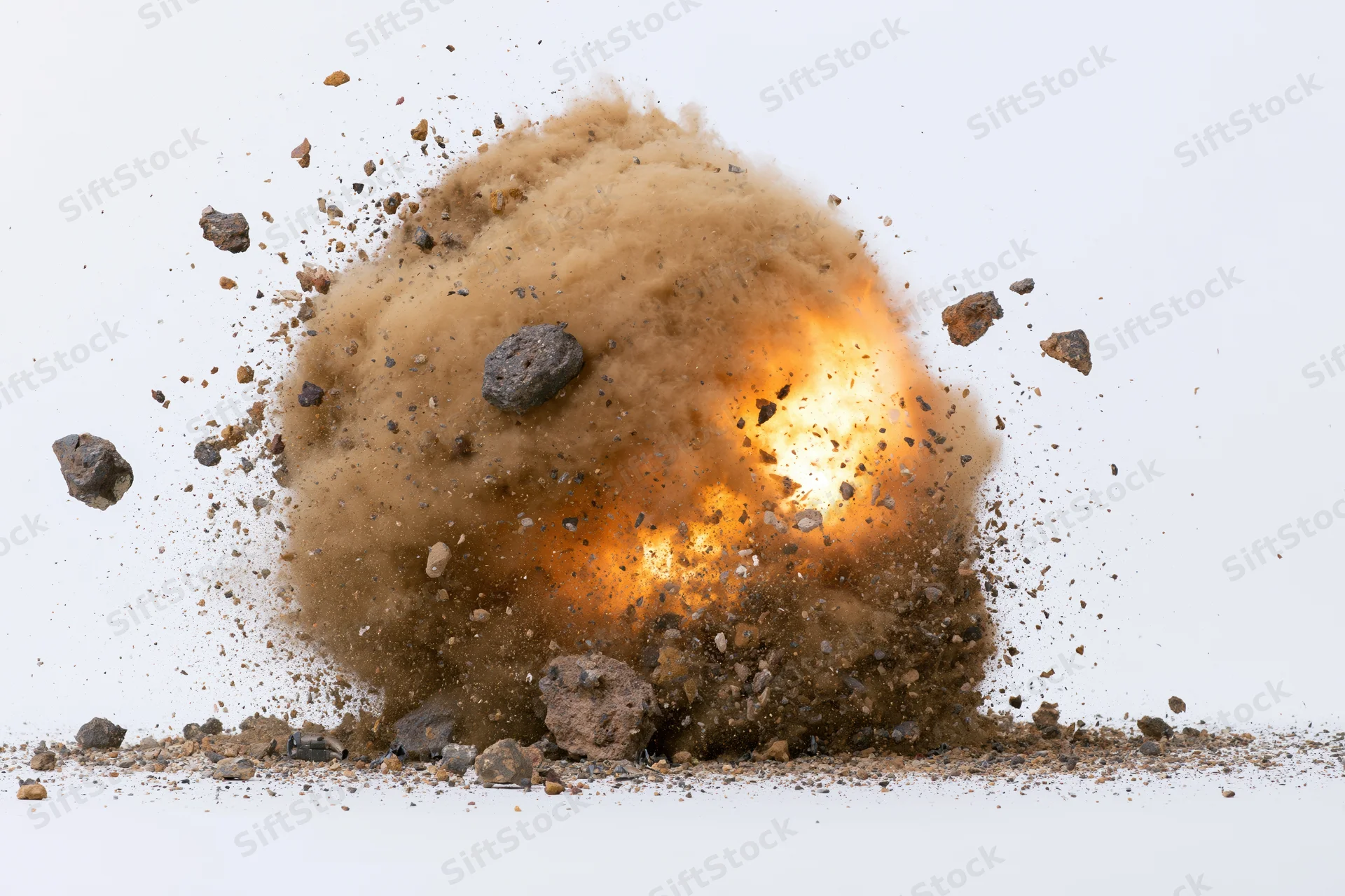 Explosion mid-burst with flying debris and smoke against white background
