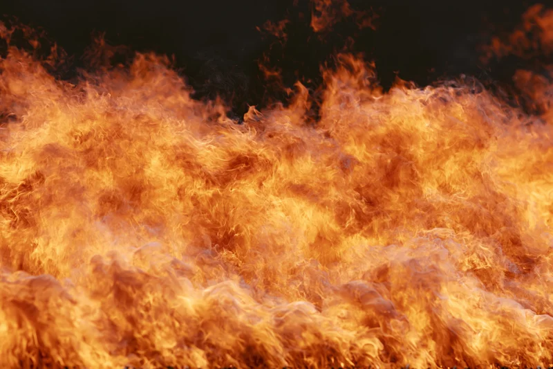 Large wall of open flames filling the frame shot close