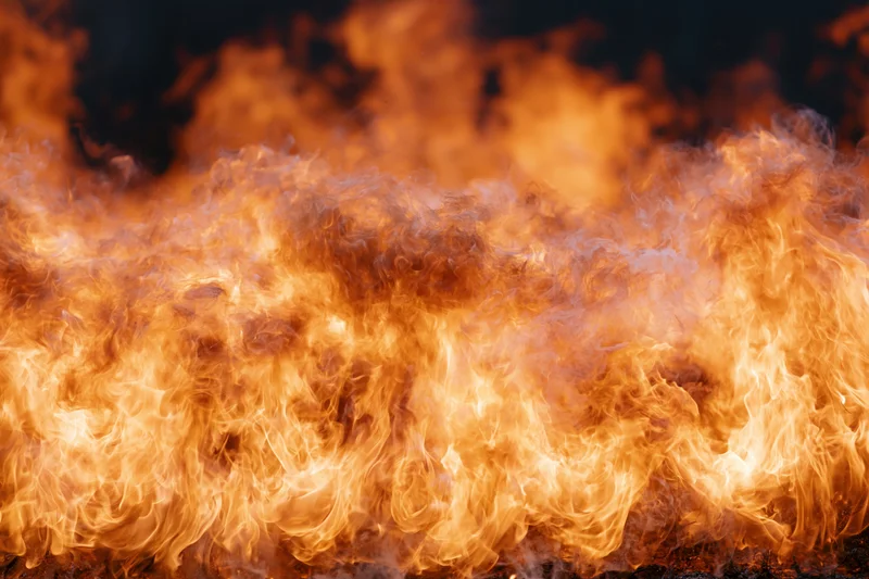 Large wall of open flames filling the frame shot close