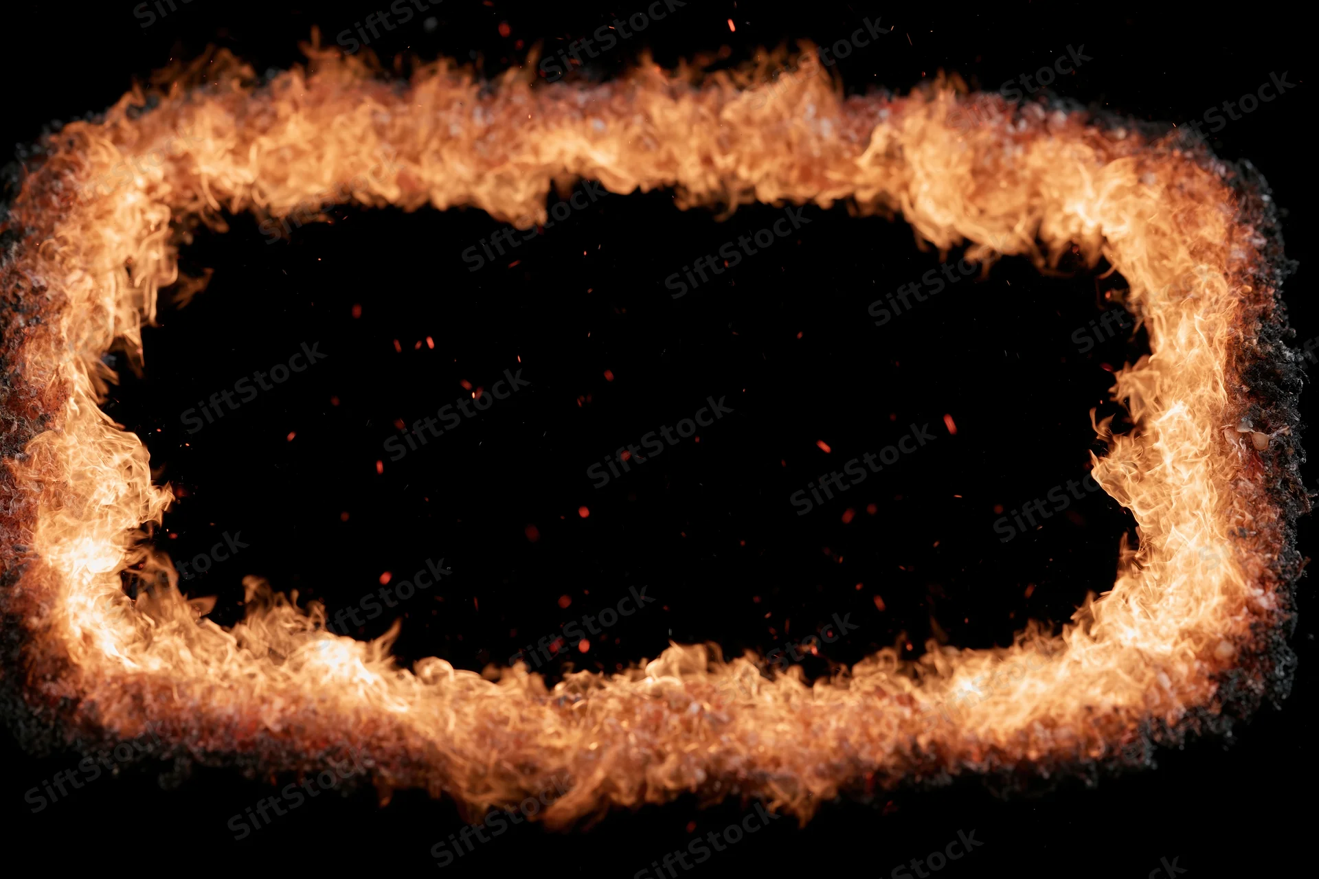 Rectangular ring of flames burning brightly against a dark background