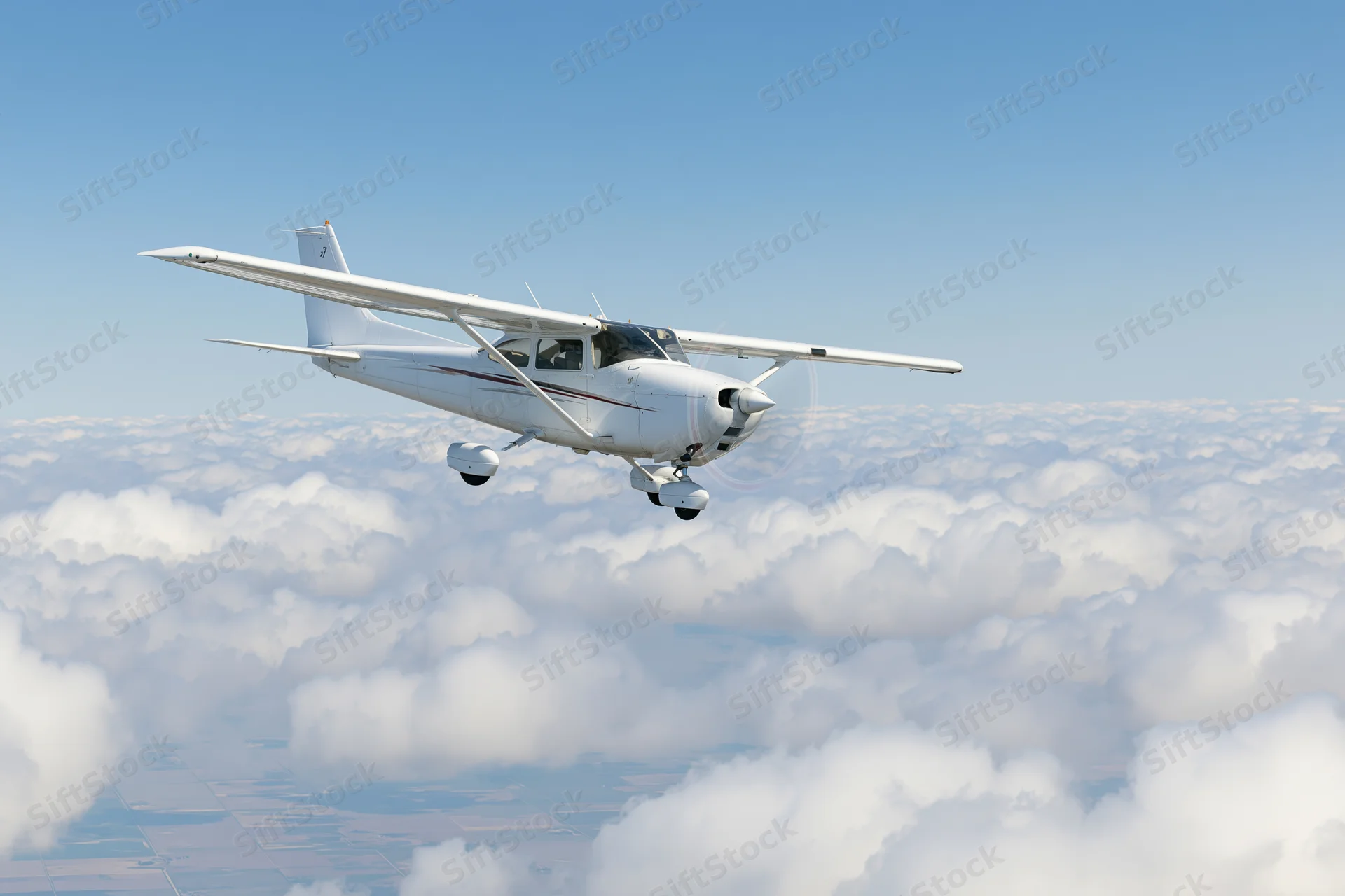 Small white single-engine propeller plane in level flight above cloud layer