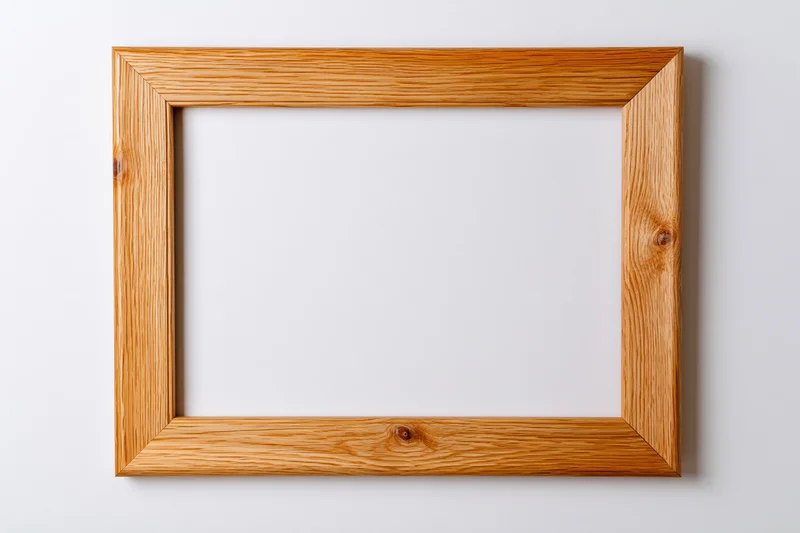 Wooden picture frame hanging on a white wall with empty center