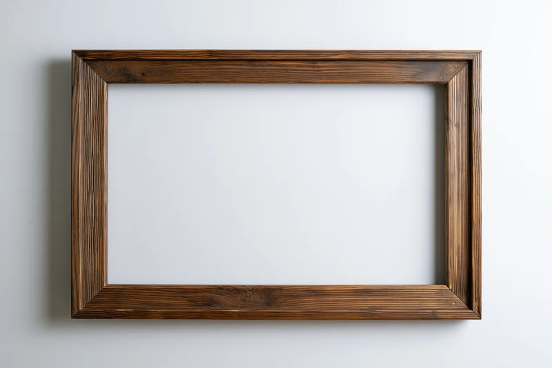 Rustic wooden picture frame hanging on a white wall with empty center