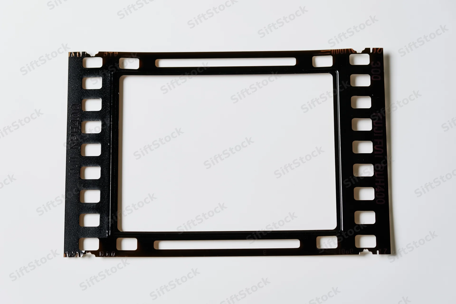 Blank 35mm film frame with black border and white center on white background