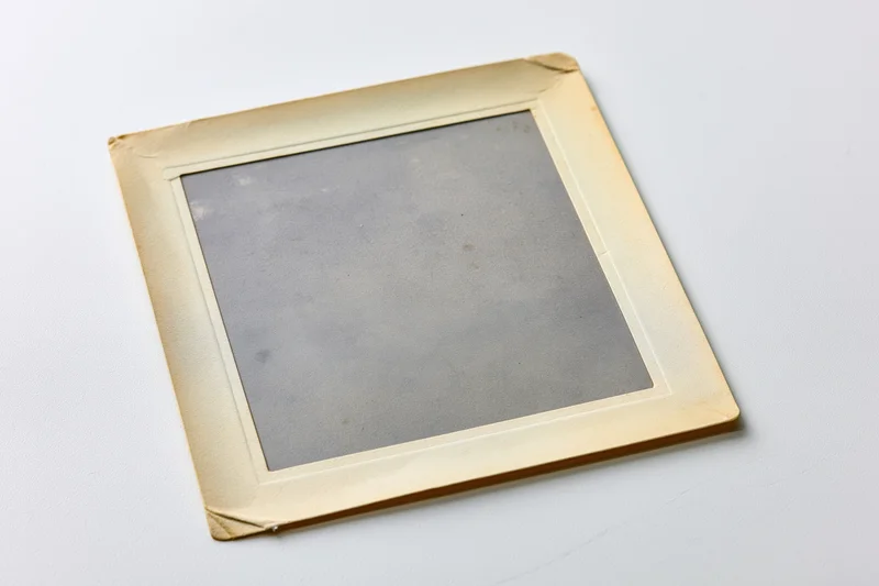 Vintage photograph print lying flat on white surface