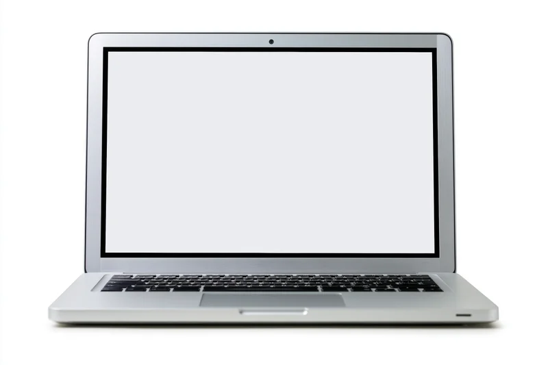 Silver laptop with blank white screen on white background
