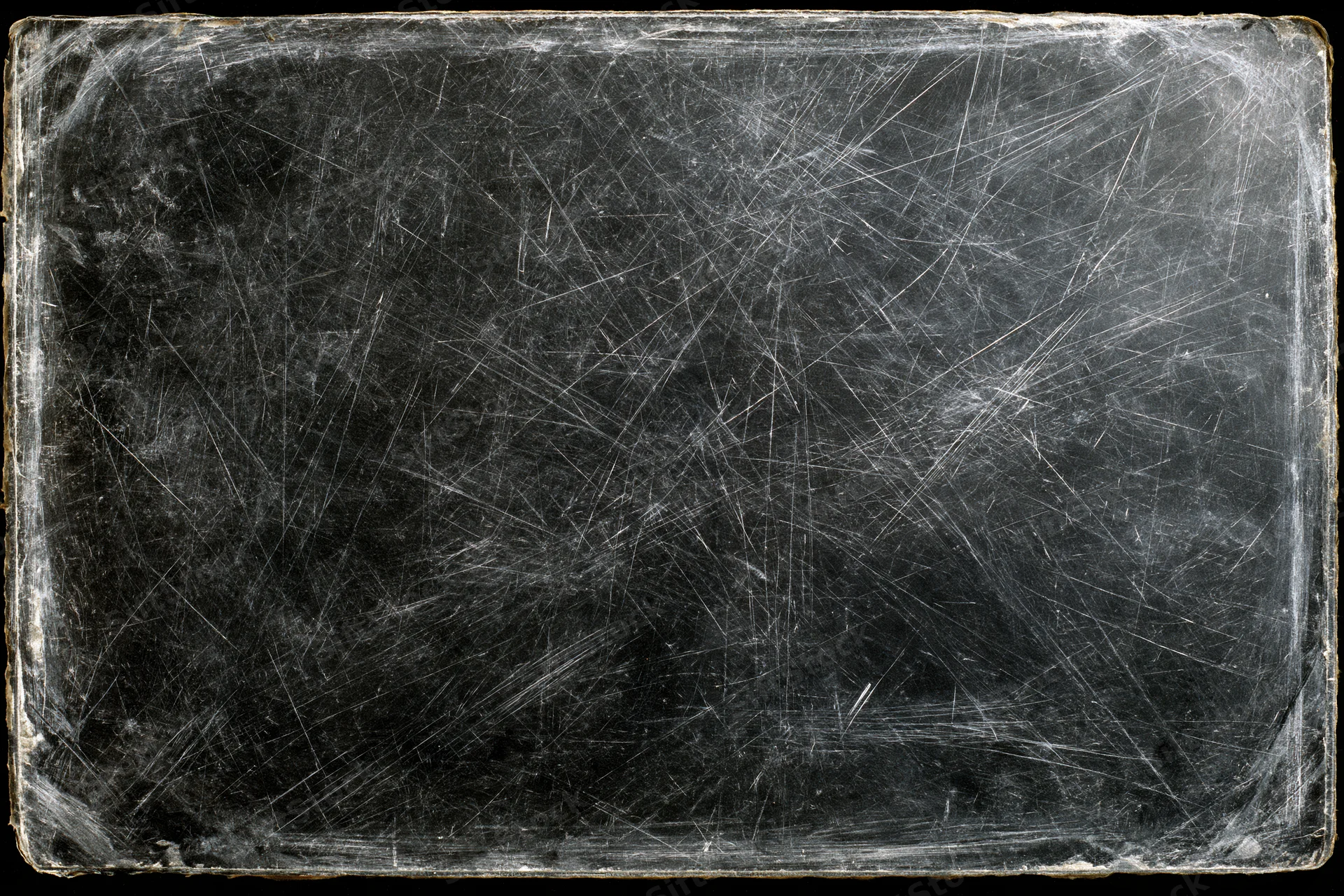 Heavily scratched and worn darkroom photographic paper with visible texture and age marks