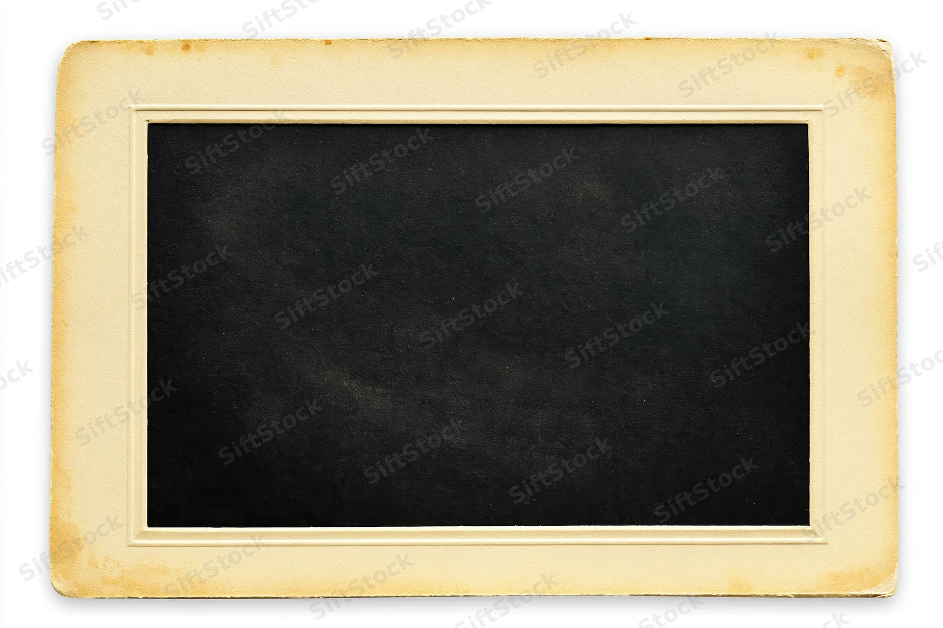 Vintage blank photographic print with cream border lying flat on white background
