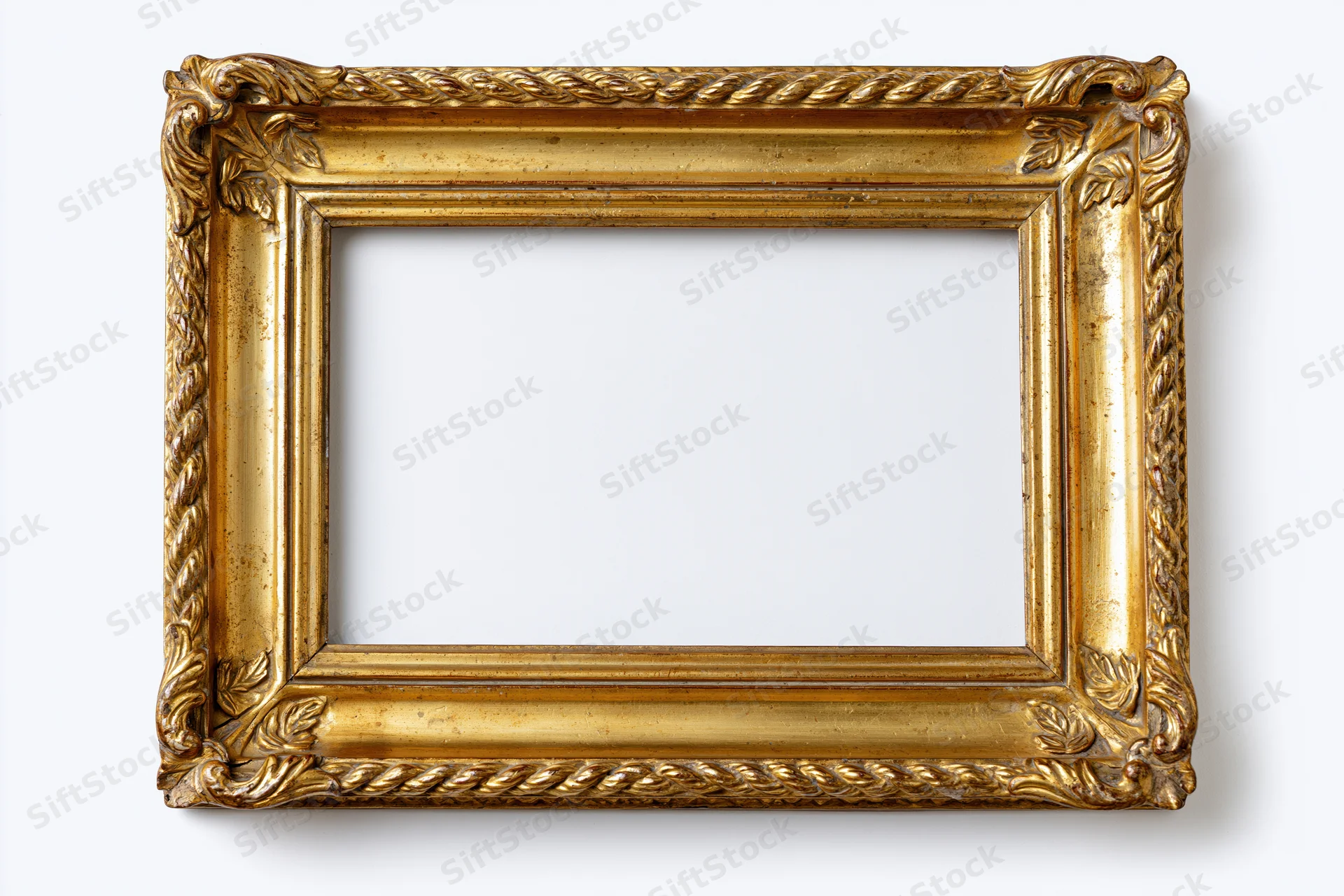 Ornate antique gold picture frame with carved rope and leaf details on white background
