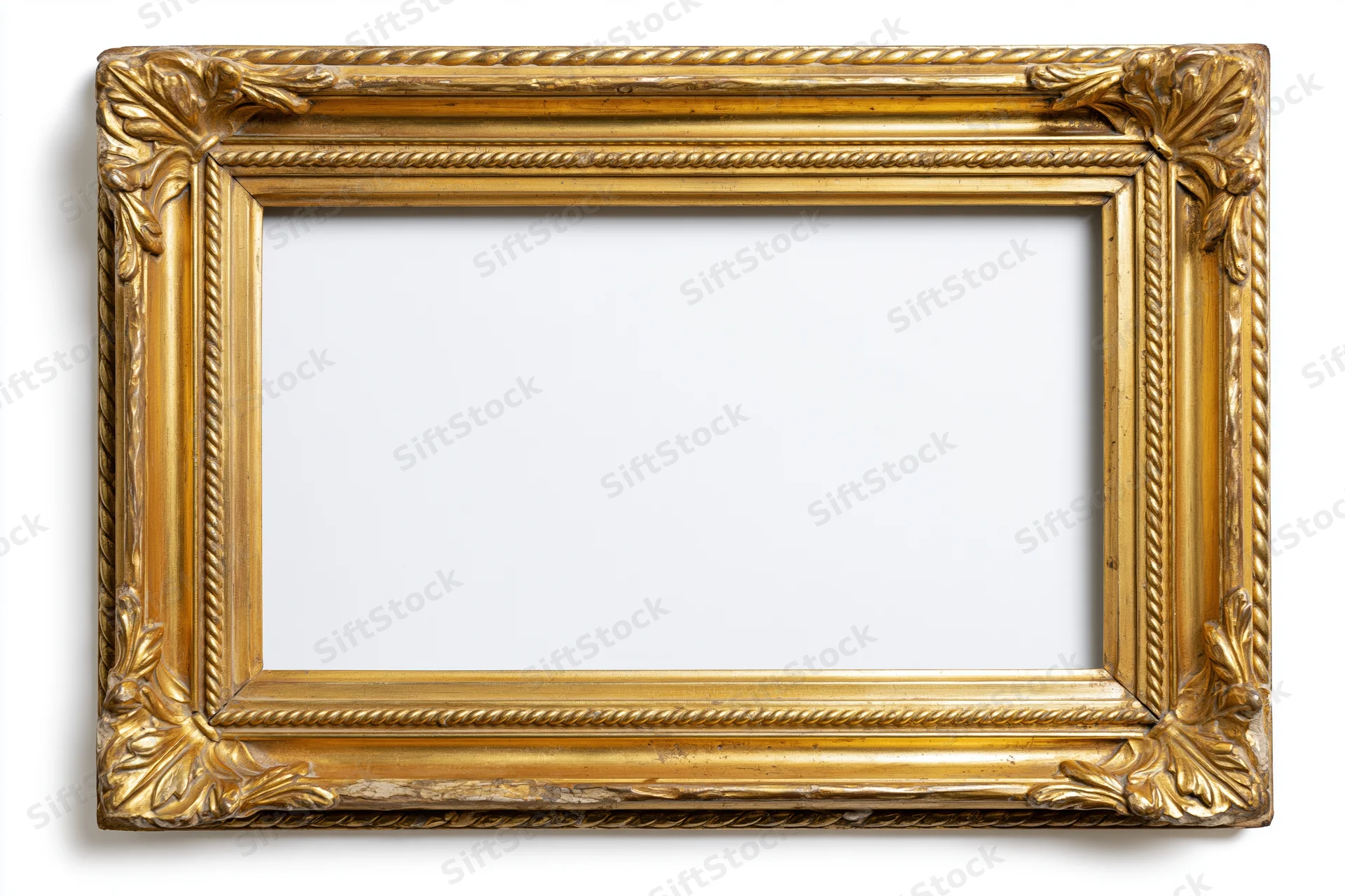 Ornate gold picture frame with carved leaf details on white background