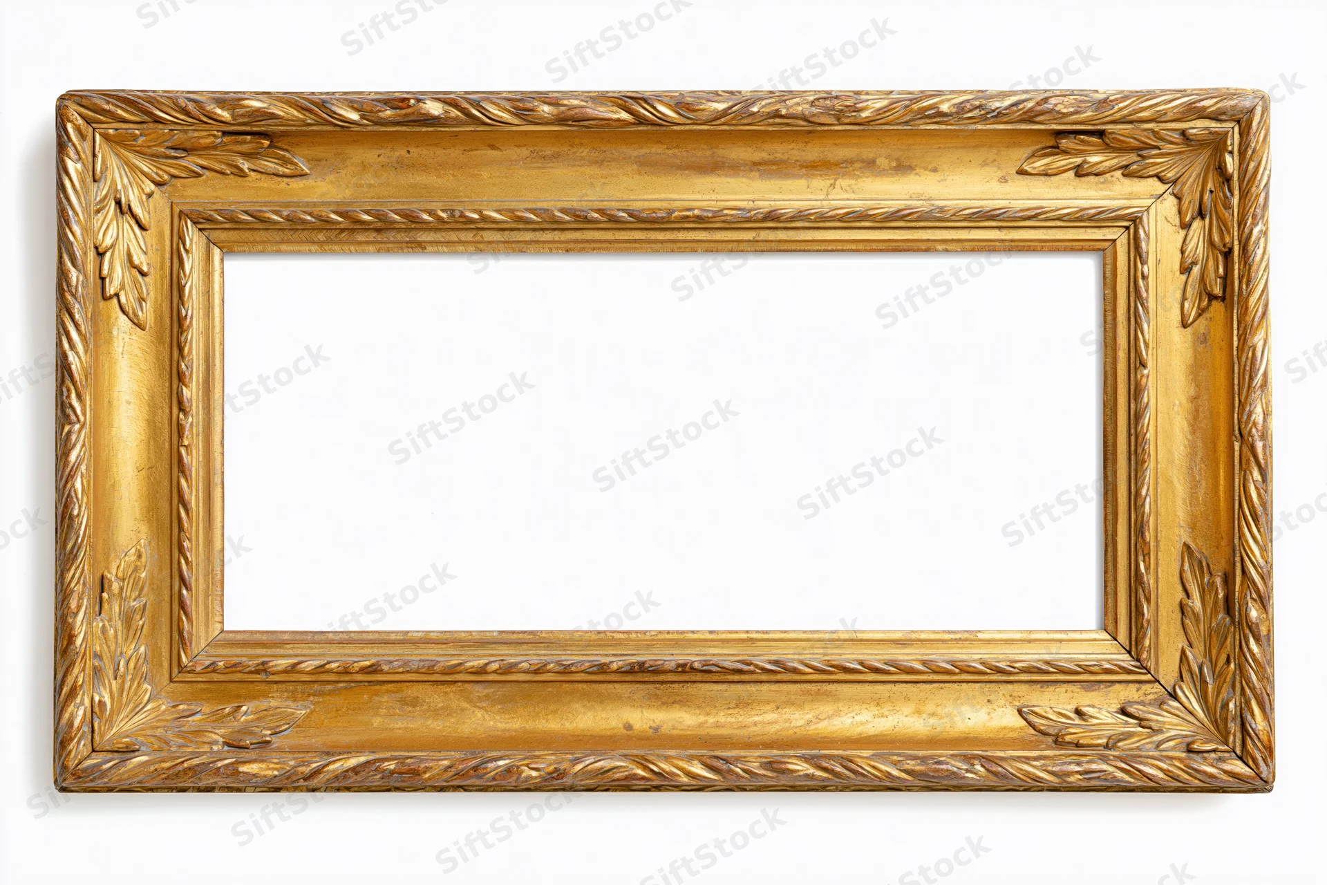Ornate gold picture frame with carved leaf details on white background