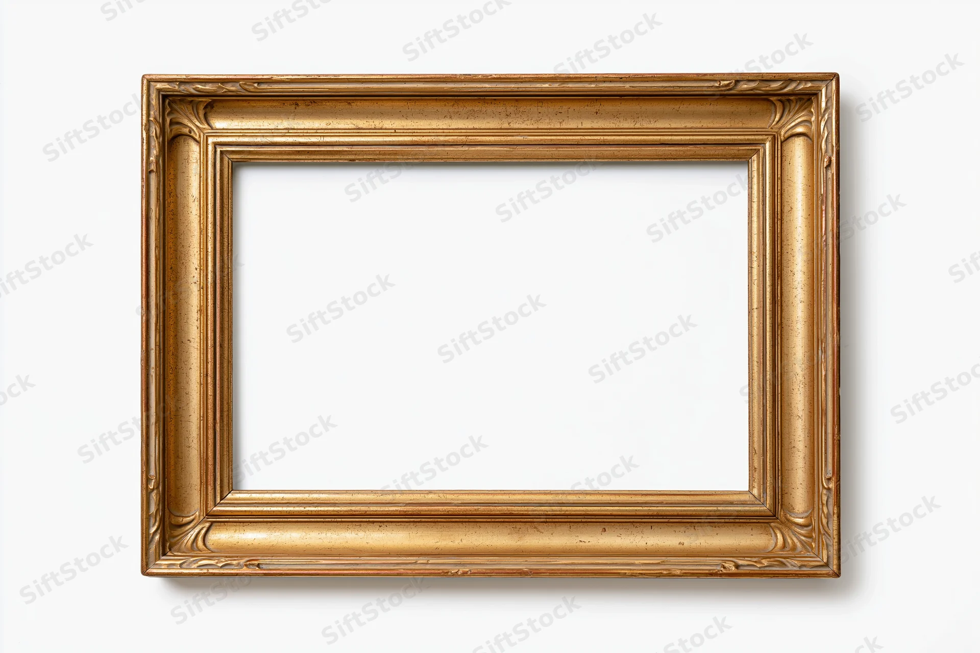 Ornate gold picture frame with carved details isolated on white background