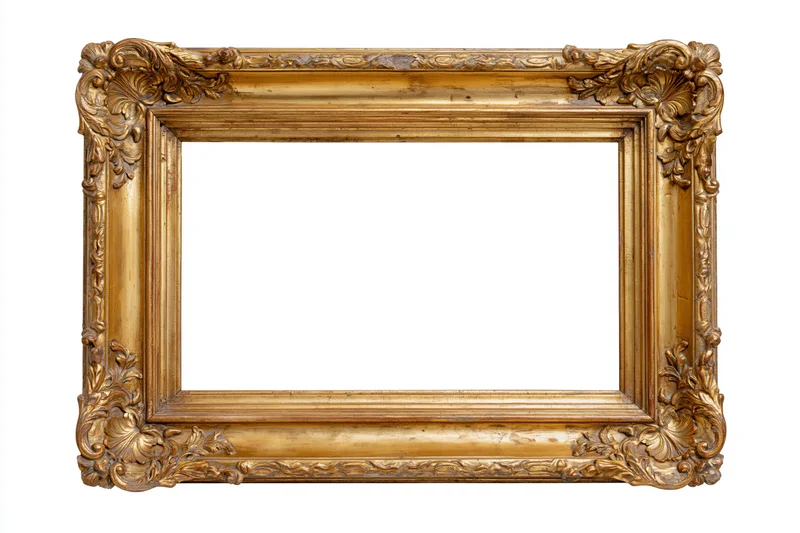 Ornate antique gold picture frame with carved details isolated on white background