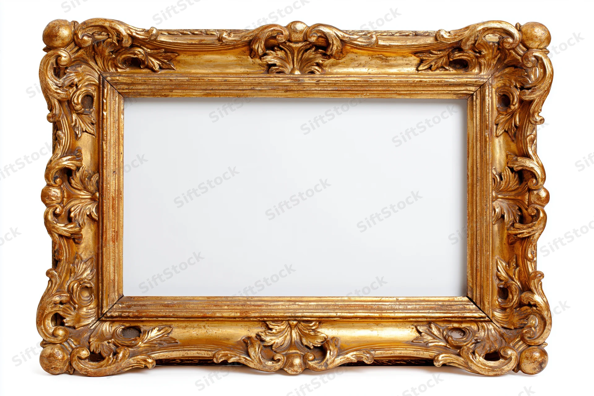 Ornate gold antique frame with intricate carvings and empty white interior isolated on white