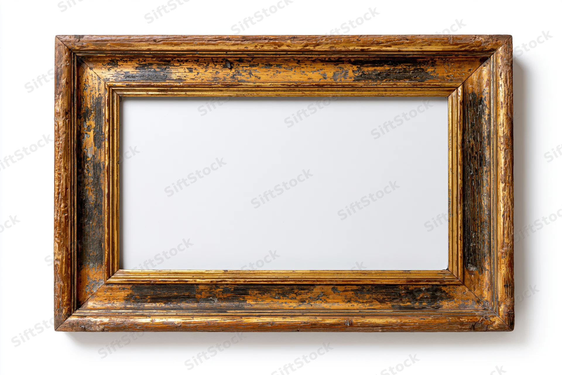 Antique wooden picture frame with worn gold-bronze finish isolated on white background