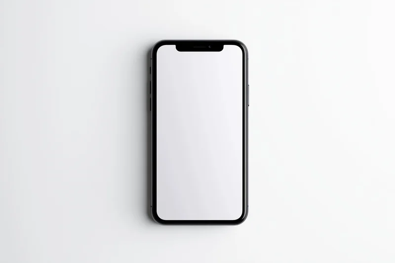 Black smartphone with blank white screen on white background