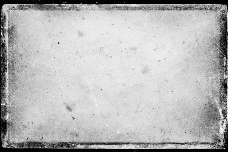 Blank aged film frame with overexposed texture and distressed border