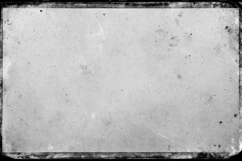 Blank aged film frame with distressed texture and overexposed center